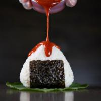 Bulgogi Beef Triangle Kimbap · Two triangle-shaped rice balls stuffed with all-natural bulgogi beef and garnished with a st...