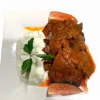 37. Iskender · Gyro served over bread with yogurt and fresh tomato sauce.