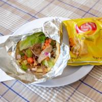 5. Gyro Sandwich · Marinated and boiled meat with onion, tomatoes and special sauce wrapped in pita bread.