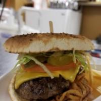 1/4 lb. Cheeseburger · Served with fried onions, melted cheese, pickles, tomatoes and lettuce.