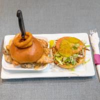 Addy's Amarillo House Burger · Char grilled and finished in our house special mushroom sauce. Served separately from the bun.