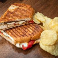 #18 Grilled Chicken Panini · grilled chicken with roasted red peppers, sauteed spinach, fresh mozzarella on whole wheat p...