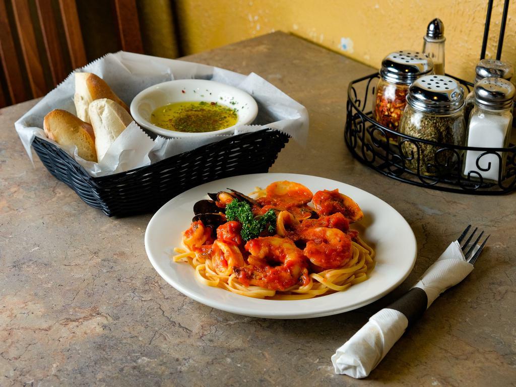 Pasta alla Pescatore · Fresh shrimp, calamari, clams and mussels in a marinara or garlic sauce.