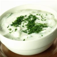 Raita Salad · A choice of finely chopped onions, tomatoes, cucumbers and boiled potato chunks in yogurt, f...