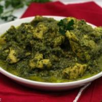 Chicken Saag · Chicken cooked with fresh spinach and herbs.