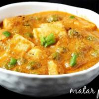 Mutter Paneer · Green peas cooked with homemade cheese.