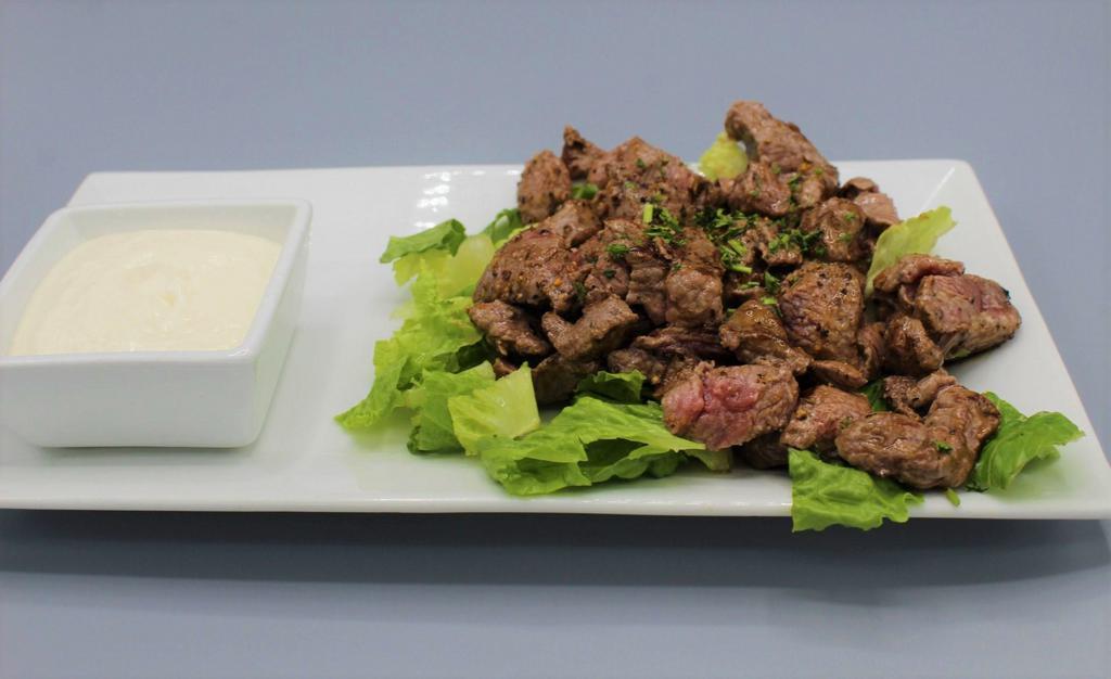 Steak Bites · 8 oz. top sirloin, seasoned and grilled medium-rare, creamy horseradish sauce.