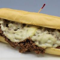 Philly Cheesesteak · Shredded sirloin, grilled onions and peppers, melted provolone, tomato aioli.