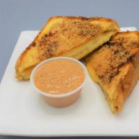 Jeff’s Grilled Cheese · Our classic garlic butter and parmesan-crusted cheese sandwich and chipotle tomato aioli. Ma...