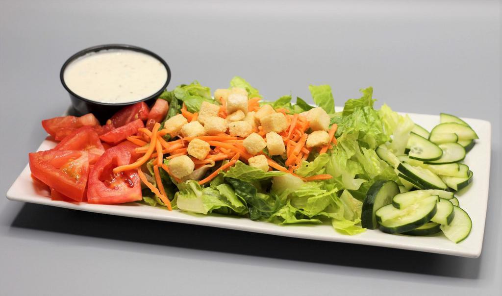 House Salad · Fresh chopped romaine lettuce, tomato and cucumber. Topped with shredded carrots and garlic croutons. Choice of dressing. 