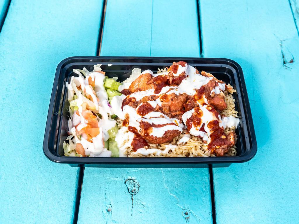 4. Chicken Tikka Masala Plate · Boneless chicken cube, basmati rice, white sauce and hot sauce.