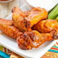 25. Chicken Wings · 6 pieces.