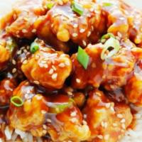 S10. Sesame Chicken · Fine and flavor chunk, chicken served with tossed sesame seeds topping.