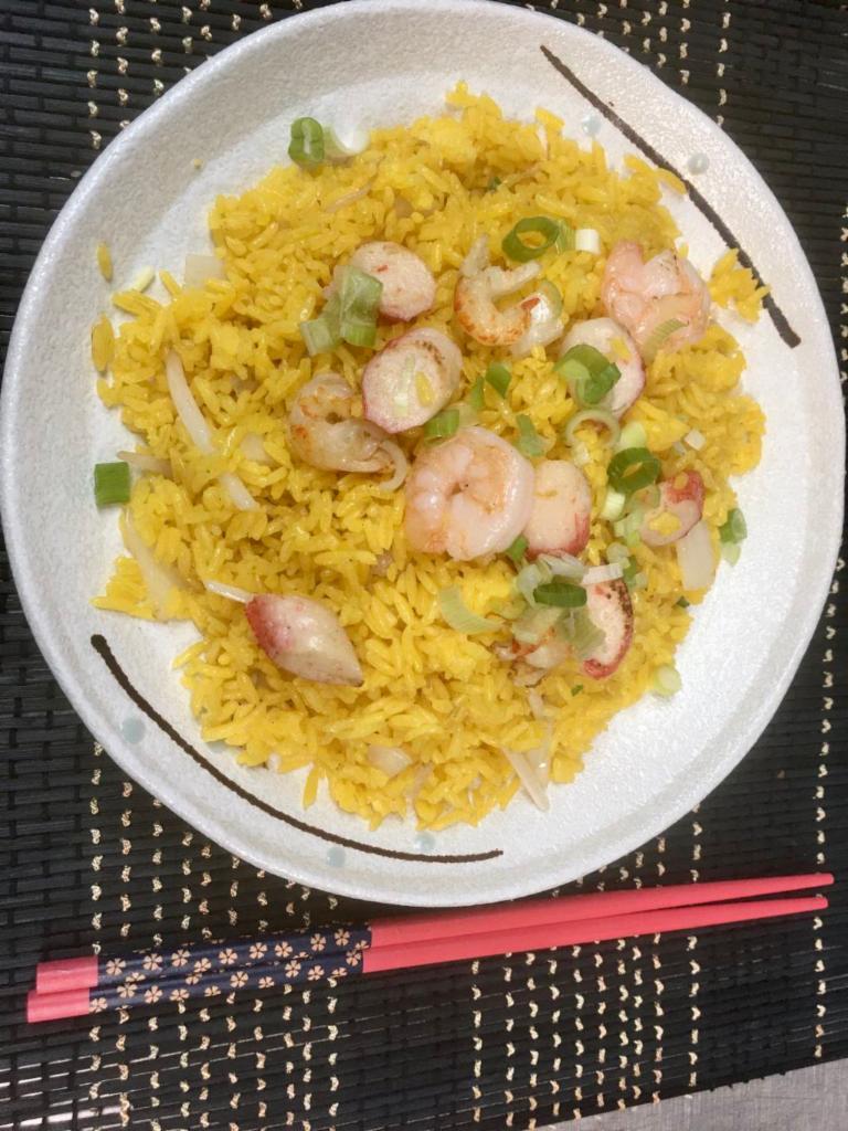 64. Seafood Fried Rice · Stir fried rice with seafood.