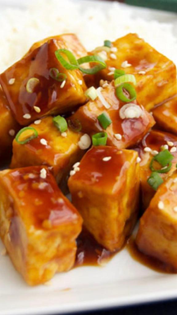 S1. Sesame Bean Curd · Tofu served in a sweet sauce served with sesame seeds.