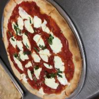 Margarita Pizza · Fresh mozzarella, tomato sauce, olive oil and basil.