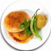 Vada Pav · Hamburger roll with Fly Indian style potato spicy.