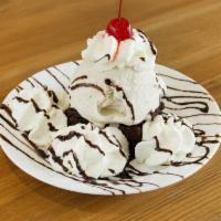 Hot Brownie Fudge Sundae · Chocolate brownie and ice cream, with hot fudge, whipped cream, and cherries.