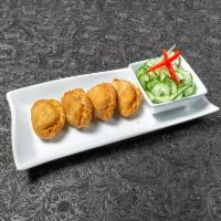 Chicken Curry Puff · Small pie consisting of specialized curry with potatoes, deep-fried, served with cucumber sa...