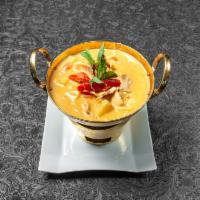 Pineapple Curry Special · Red curry paste, coconut milk, pineapple, tomato, bell pepper, and Thai basil. Choice of pro...