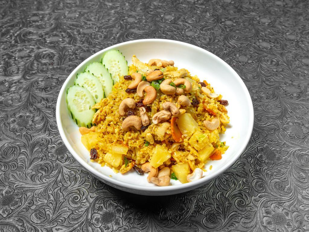Pineapple Fried Rice Special · Cashew, pineapple, carrots, raisin, onion, green onion, and curry powder. Choice of protein.