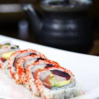 Chef's Special Roll · Tuna, salmon, yellowtail, white fish, avocado, cucumber with tobiko outside.
