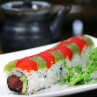 Wasabi Tobiko Roll · Salmon, tuna, avocado with wasabi tobiko on top.