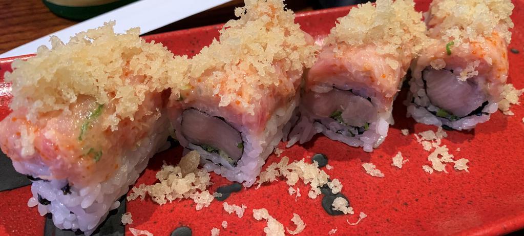 Yellow River Roll · Yellowtail and scallion roll topped with spicy yellowtail and tempura flake.