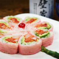 Spicy Girl Roll · 10 pieces. Spicy salmon, tuna, yellowtail, avocado, tobiko, kani, crunch inside white seawee...