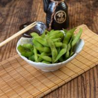 Edamame · Lightly salted boiled soy bean pods.