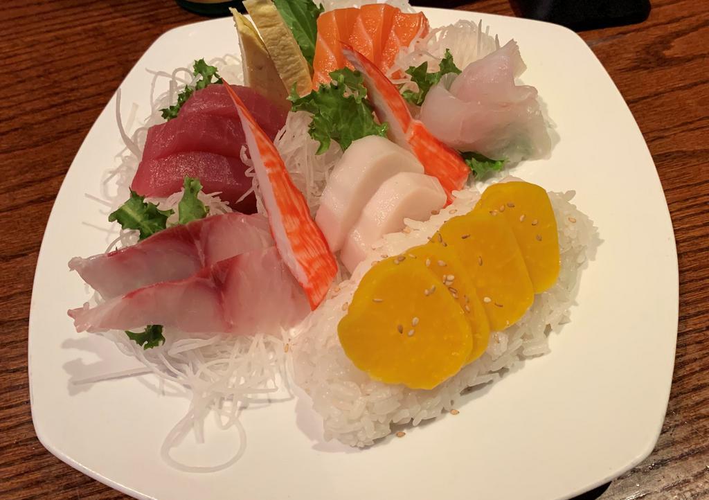 Chirashi · Assorted sashimi with sushi rice on side.
