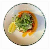 Tostada de Pulpo · Octopus escabeche, radish, carrot, avocado, onion, black cherry tomato and salsa macha this ...