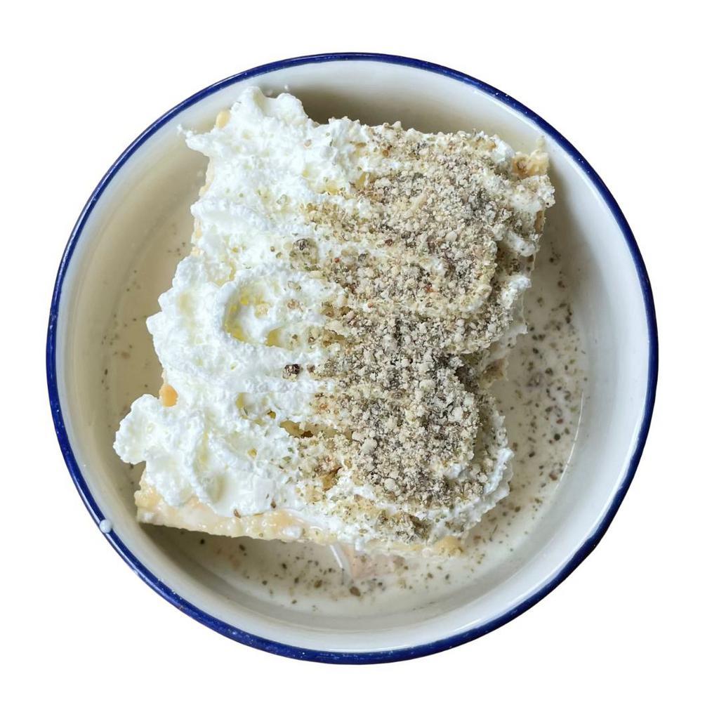 Tres Leches · A deconstructed version with mascarpone cheese, milk caramel cajeta, wheaped cream, pumpkin seed crumbs.