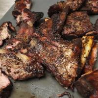 Jerk Ribs ONLY · Marinated, and immersed in our special blend of spices then grilled to perfection. 