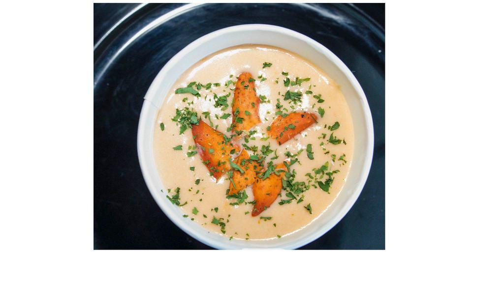 BK Lobster Bisque · Creamy tomato based soup served with chunks of lobster meat.