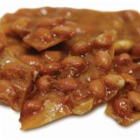 Peanut Brittle · A classic crunchy peanut treat.  Sweet, salty and nutty! 14 ounce.