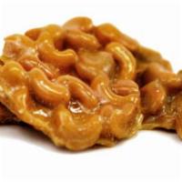 Cashew Brittle · A classic crunchy cashew treat.  Sweet, salty and nutty! 14 ounce.