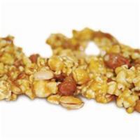 Peanut Corn 7 ounce Bag · Freshly-popped corn drenched in our signature copper-kettle caramel and peanuts.