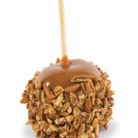 Signature Pecan Caramel Apple · A tart Granny Smith Apple dipped in Kilwins copper kettle cooked caramel covered in pecans.