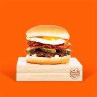 Egg and Bacon Smashmouth · Our signature smashed hamburger patty topped with bacon, a fried egg, American cheese, and m...