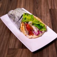 Grilled Chicken Pita · Grilled chicken breast with lettuce, tomatoes and onions stuffed in a pita.