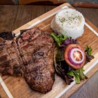 PORTER HOUSE STEAK ·  Butcher selected grilled to perfection  and seasoned with our house season