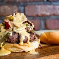 Philly Cheese Burger · Steak, Sauteed peppers, Onions and LOTS OF CHEESE