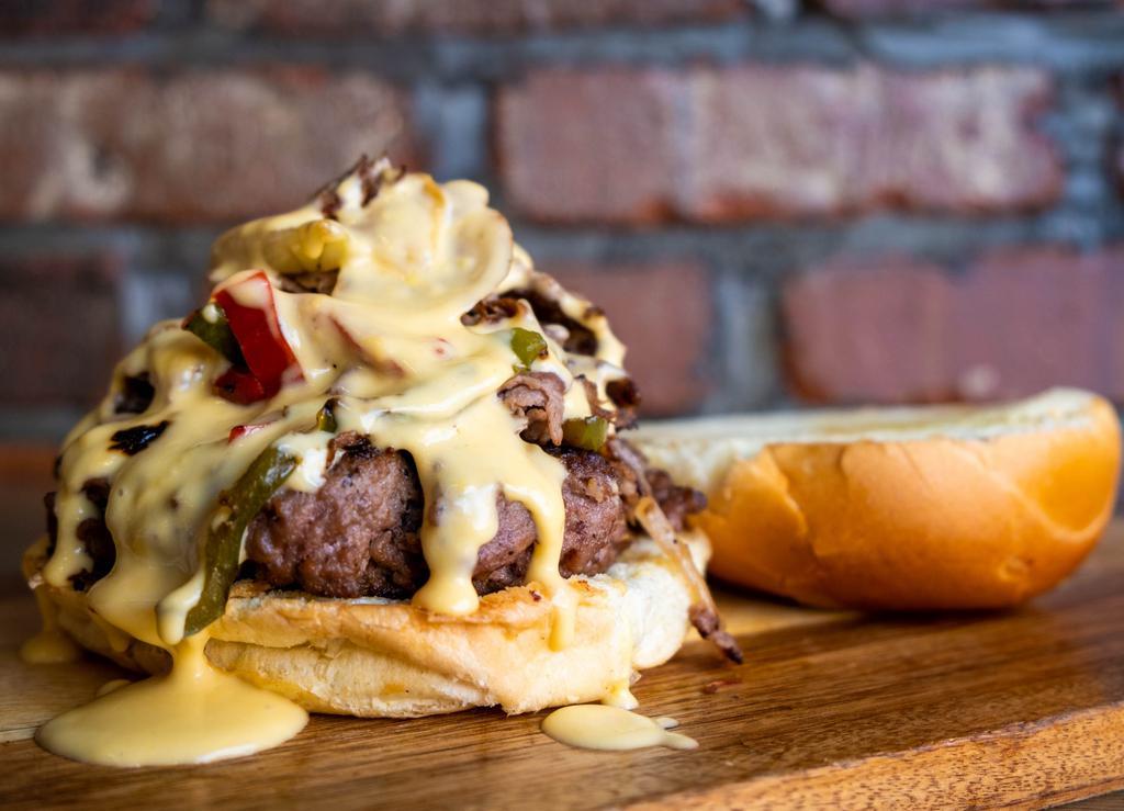 Philly Cheese Burger · Steak, Sauteed peppers, Onions and LOTS OF CHEESE