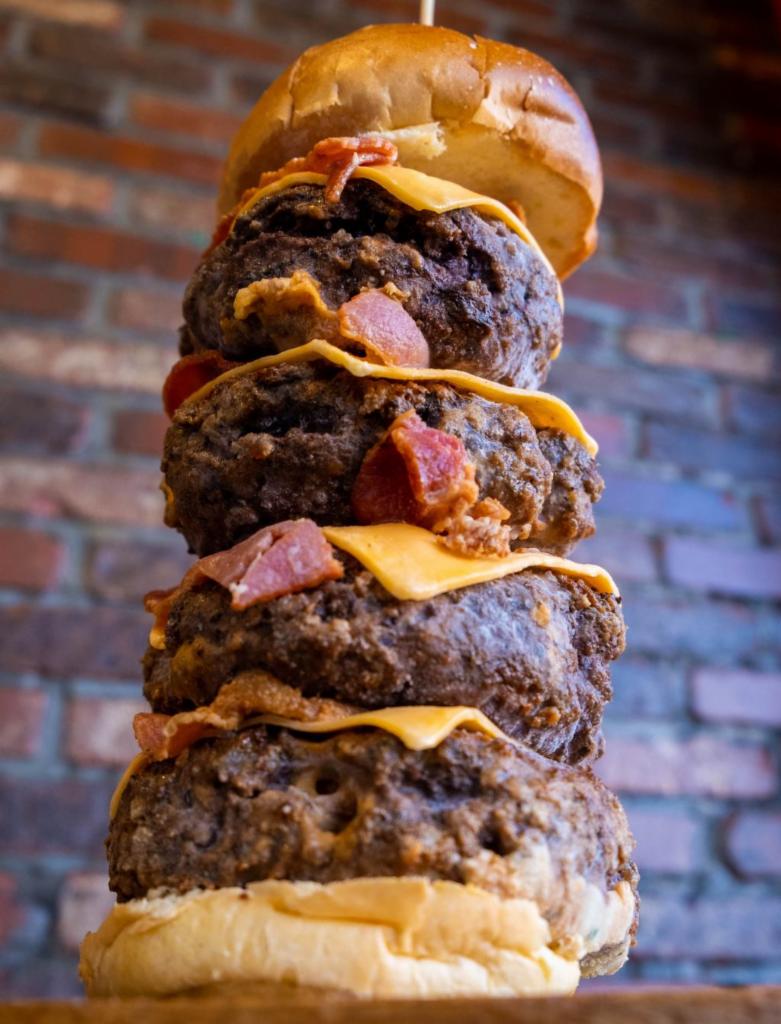 Thanos Burger · 4 Pounds of Angus beef with cheese and bacon inside the burgers and outside the burger. 
