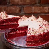 Red Velvelt Cake · Double decker cake with a vanilla frosting in the middle 