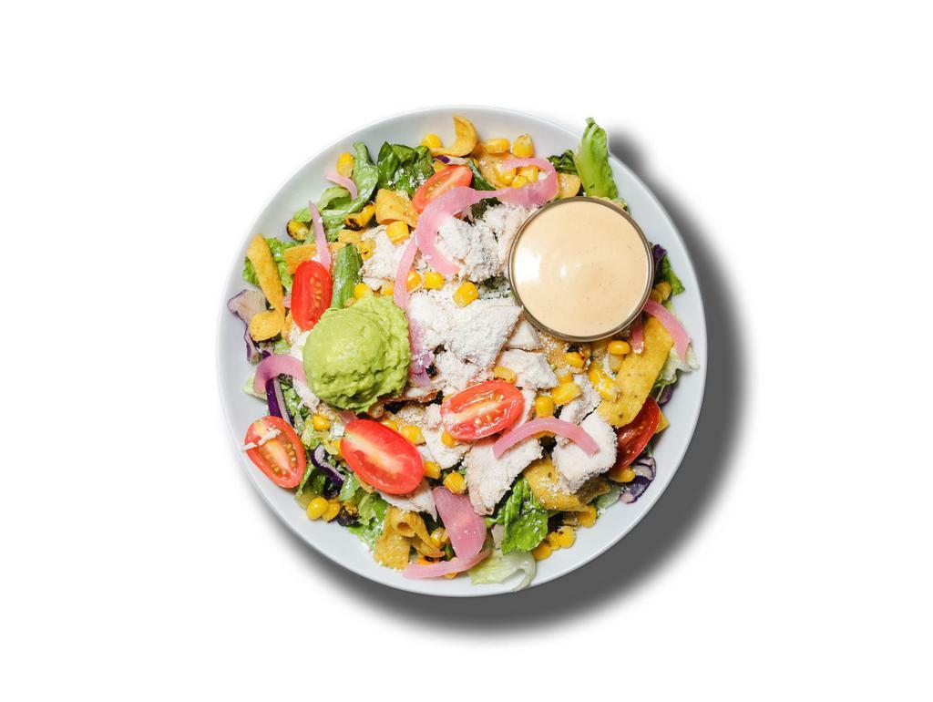 Grilled Chicken Chipotle Ranch Salad · Grilled Chicken, Grated Cheese, Roasted Corn, Pickled Red Onion, Grape Tomatoes, Cilantro, Avocado Mash, Fritos & Chipotle Dressing on Romaine.