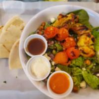 Tikka Bowl · Choice of protein, romaine lettuce, spinach, grilled seasonal vegetables, chickpeas, pico de...