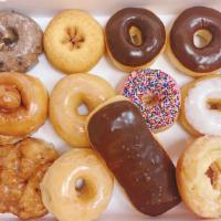 1 Dozen Mixed Donuts · Box of 2 glazed, 2 chocolate and a mixture.