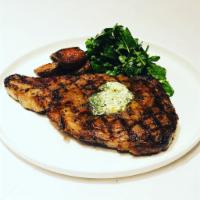 Steak Diane · Fingerling potatoes, champignons, pearl onions, bordelaise sauce 
